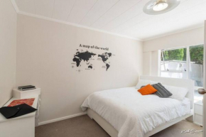 A modern 2 bedroom with private backyard, kitchen.